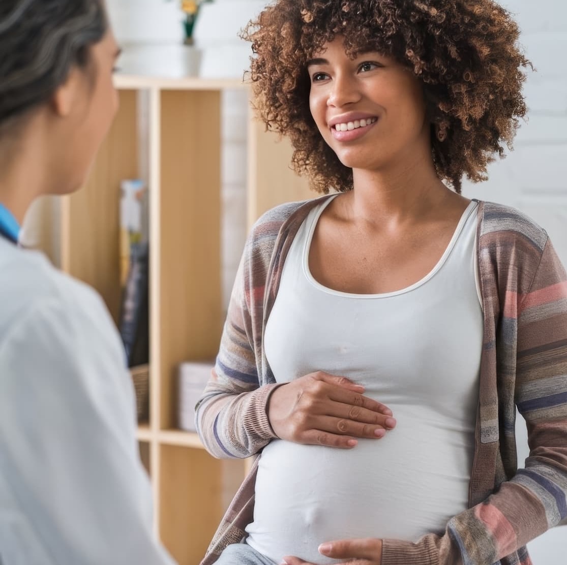 pregnant-woman-happily-seeks-advice-from-gynecologist-hospital-clinic-pregnancy-guidance